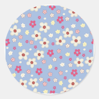 lente bloemen op blauwe achtergrond ronde sticker