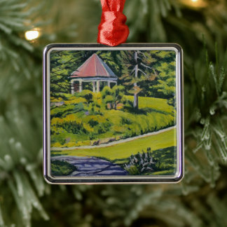 Lentetuin met paden in roze en groen metalen ornament