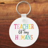 LERAAR VAN TINY HUMANS SLEUTELHANGER (Voorkant)