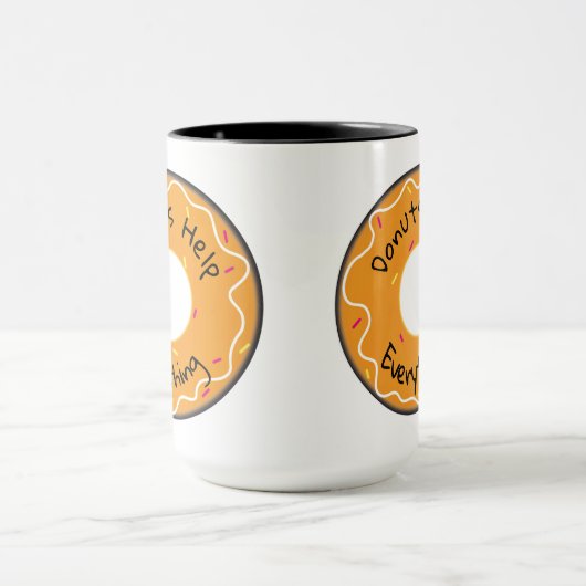 Les beignets De Mug Aident Tout (Centre)