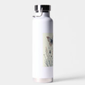 Les bouteilles d'eau papillon (Plage)
