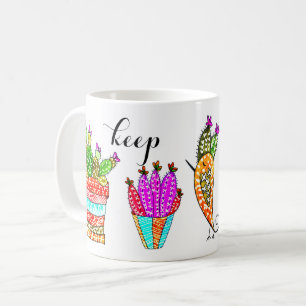 Les cactus mignons et colorés gardent la tasse