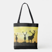 Les cerfs silhoués sur un sac (Dos)