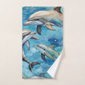 Les dauphins nageant dans la mer (Serviette à main)