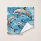 Les dauphins nageant dans la mer (Gant de toilette)