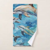 Les dauphins nageant dans la mer (Serviette à main)