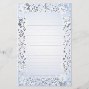 Les flocons de neige ont rayé le papier à lettre