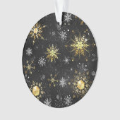 Les flocons dorés de Noël sur l'Arrière - plan noi (devant)