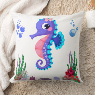 Les hippocampes jouant sous le Coussin de mer