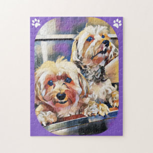 Les mignons chiens qui ont un puzzle