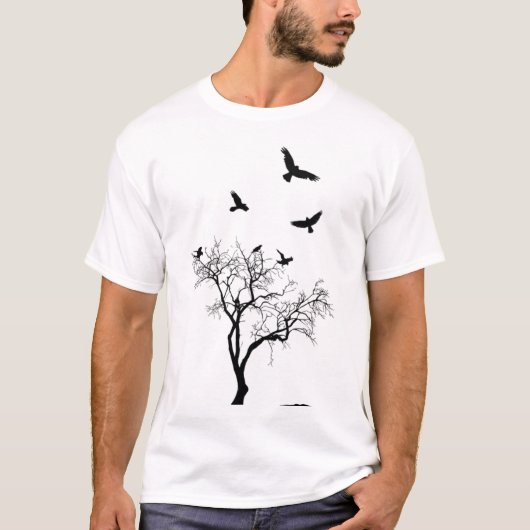 Les oiseaux volent du T-shirt utilisé et déchiré (Devant)