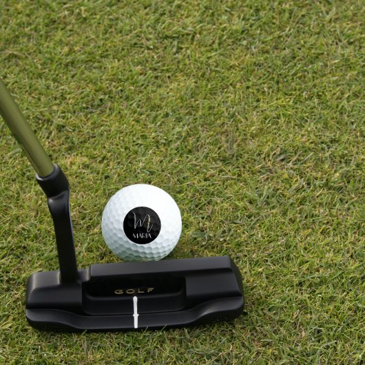 Letter M monogram rode waterverf mam zwart Golfballen