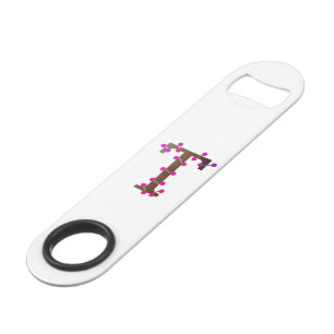 Lettre T initiale décorative en blanc