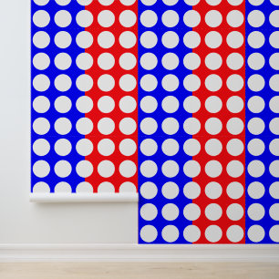 Leuk en speels blauw, rood en wit gestippeld behang