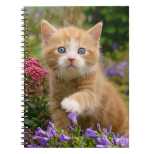 Leuk gemberkatje in een tuin notitieboek
