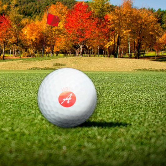 Leuk monogram initiaal Een oranje koraal Golfballen