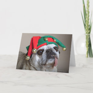 Leuk uitziende pug met tong die uit hangen feestdagen kaart