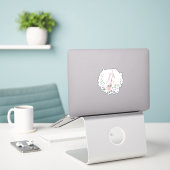 Leuke eenhoorn met bloemenkrans sticker (Laptop op bureau)