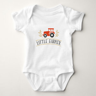 Leuke kleine boer, rode tractor romper