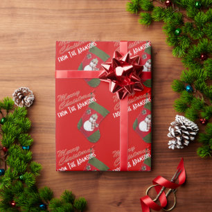 Leuke Sneeuwman op de Kous van Kerstmis over Rood Cadeaupapier
