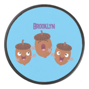 Leuke vrolijke eikels zingen cartoon voor kinderen hockey puck