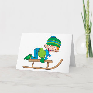 Leuke wintersleeënde jongen schattige sneeuwavontu kaart
