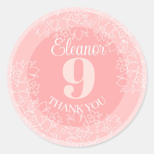 Leuke witte wilde bloemen patroon op roze ronde sticker