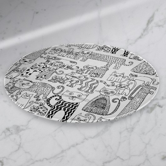 Leuke zwarte en witte katten en kittens snijplank