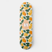 Levendig citrusvruchtenpatroon met groene bladeren skateboard (Voorkant)