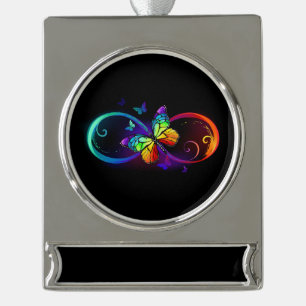 Levendige oneindigheid met regenboogvlinder op zwa verzilverd banner ornament