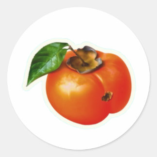 Levendige oranje kaki fruitsticker met groen ronde sticker
