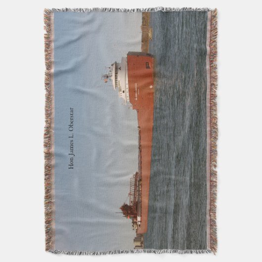 L'honorable James L. Oberstar jette une couverture (devant Vertical)