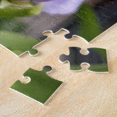Libel met blauwe ogen op bloem legpuzzel (Zijkant)