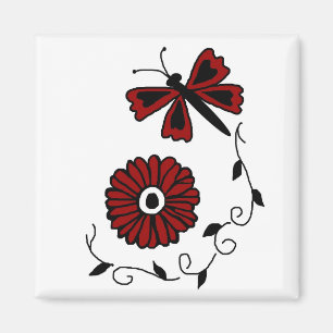 Libellule et aimant rouge de fleur