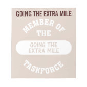 Lid van de Extra Mile Task Force Notitieblok (Voorkant)