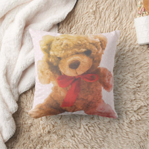 Lief teddyberenkinderspeelgoed in roze vintage-sti kussen