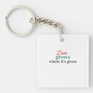 "Liefde groeit waar het gegeven wordt" Sleutelhanger