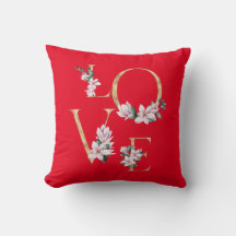 Liefde in gouden letters met magnoliumbloemen