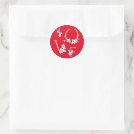 Liefde in gouden letters met magnoliumbloemen ronde sticker