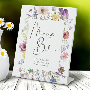 Liefde is een boho-wildebloem-mimosa-bar in bloei reclamebord met voetstuk