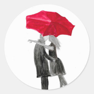 Liefde koppel met rode paraplu ronde sticker
