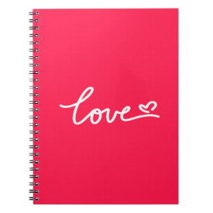 Liefhebber van witte tekst op roze notitieboek