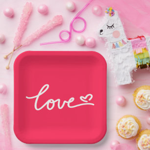 Liefhebber van witte tekst op roze papieren bordje