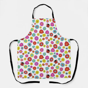 Lieveheersbeestjes in de tuin tussen de bloemen schort