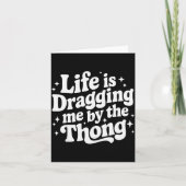 Life Is Dragging Me By The Thong Kaart (Voorkant)