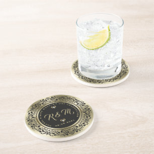 Lijst voor zwarte zwellen op gouden trouwmonogram zandsteen onderzetter