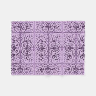 Lila rolpatroon fleece deken