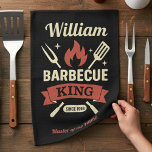 Linge De Cuisine Barbecue King Kitchen Towel with Custom Name<br><div class="desc">Add bold BBQ style to your kitchen or grill space with this Barbecue King kitchen towel featuring a custom name, flame graphic, grilling tools, and vintage-inspired banner design. Perfect for barbecue lovers, grill masters, dads, and anyone who enjoys cooking outdoors, this personalized towel brings a fun rustic touch to the...</div>