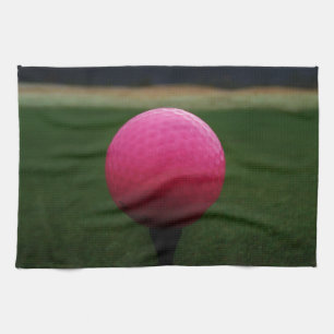 Linge De Cuisine Boule de golf rose sur un terrain de golf de