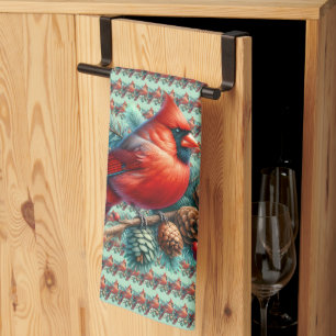 Linge De Cuisine Cardinal sur une branche de pin avec des baies d'h